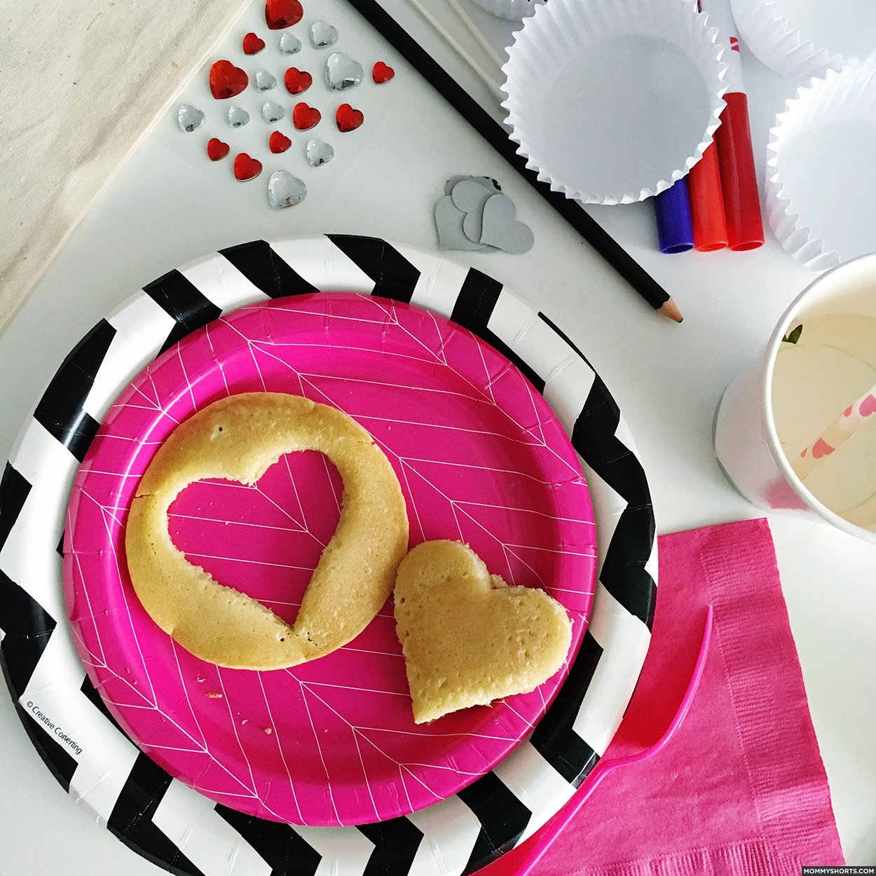 Easy heart pancakes! Click through for a bunch of Valentine's Day play date and party ideas, including Valentine snack ideas, Valentine play date decorations, and more!