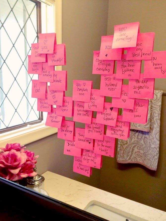 Heart notes on a mirror! Click through for 35 amazing, over-the-top Valentine's Day ideas, including Valentine's crafts, Valentine's recipes, and Valentine's decorations, and more!