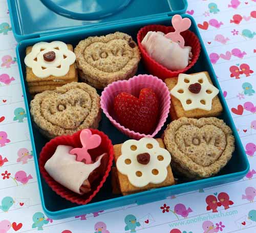 Valentine bento! Click through for 35 amazing, over-the-top Valentine's Day ideas, including Valentine's crafts, Valentine's recipes, and Valentine's decorations, and more!