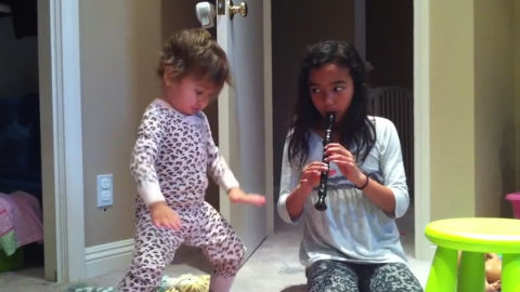 Little girl really loves recorder music